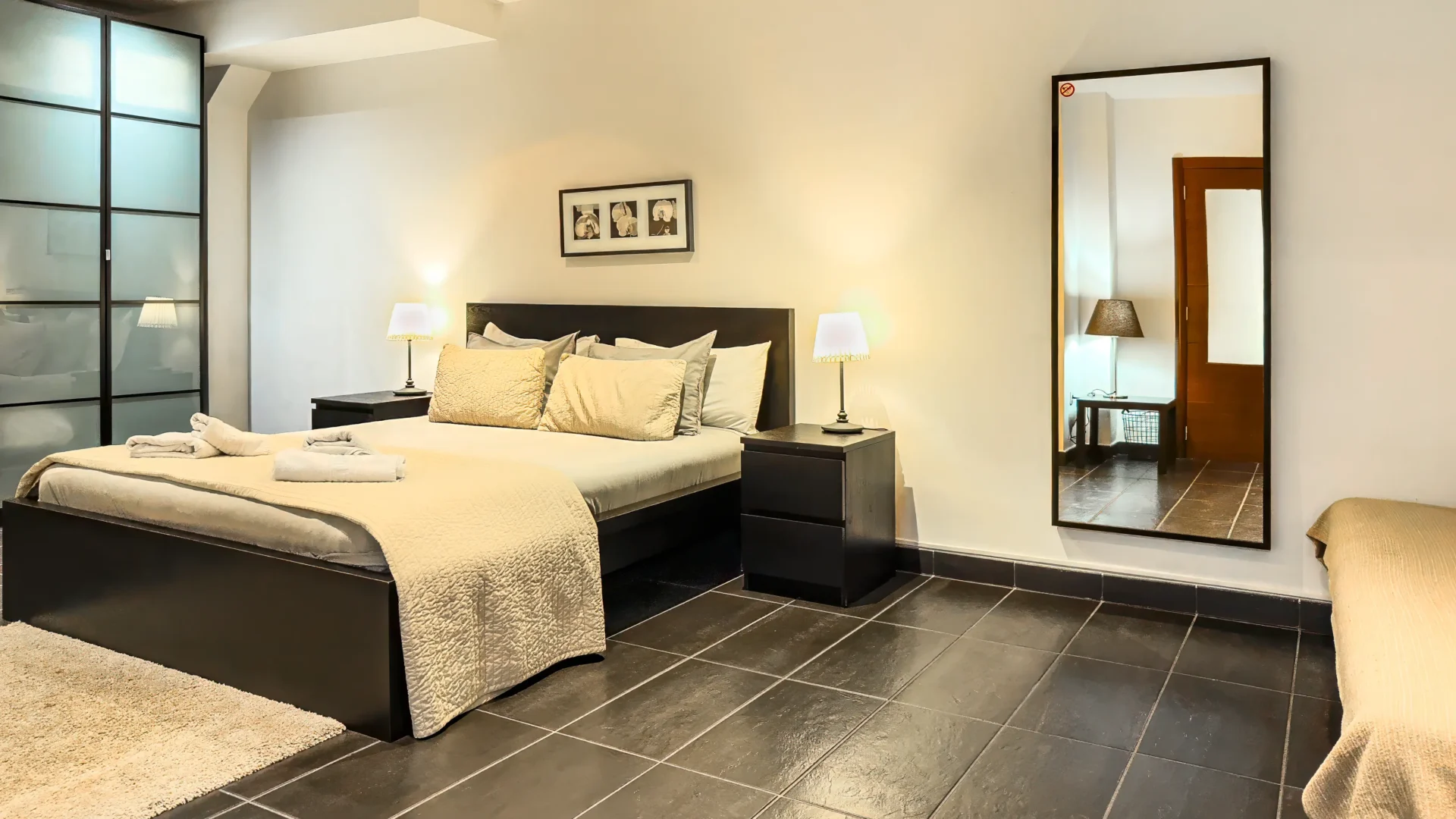 Large bedroom with king size bed and private bathroom at Villa Julia in Costa Adeje
