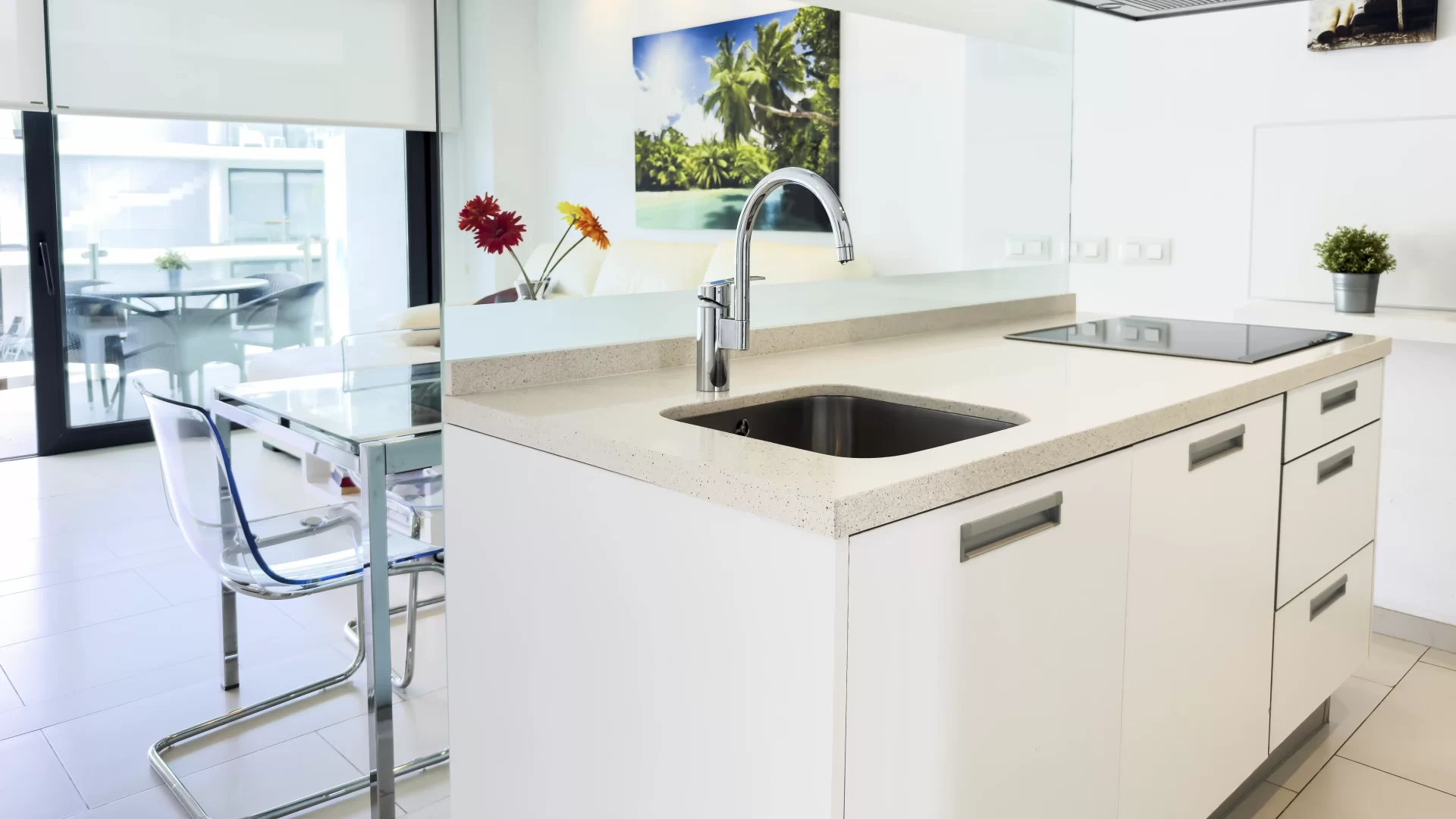 open space kitchen counter with glass wall in quiet holiday rental apartment in Palm-Mar